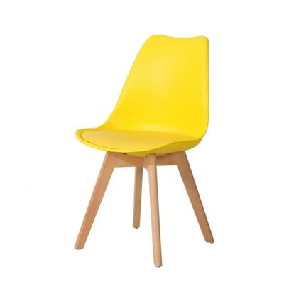 comprar Sillas de comedor de cuero tapizado amarillo de plástico de PP sillas de comedor modernas con patas de madera Fabricación en línea
