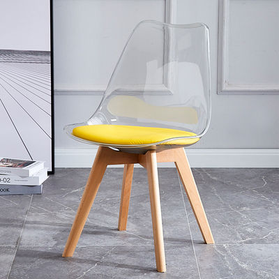 comprar Mesa de comedor de plástico transparente con sillas de tulipán Pu almohadilla Piernas de madera de haya Fabricación en línea